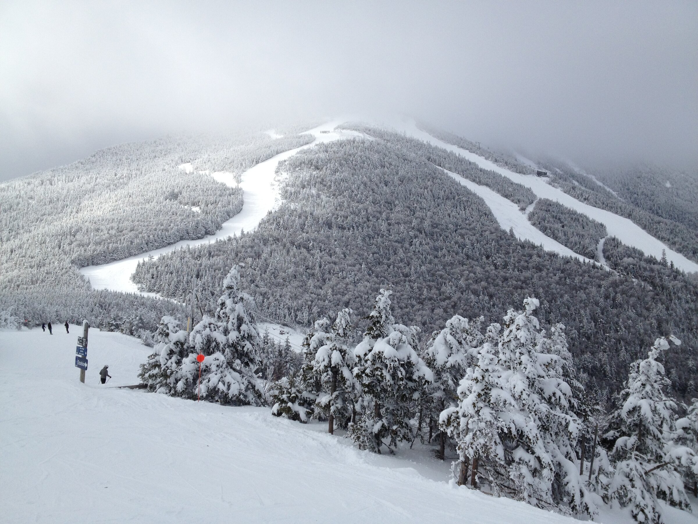 Whiteface Mountain in winter with deep snow and ski trails